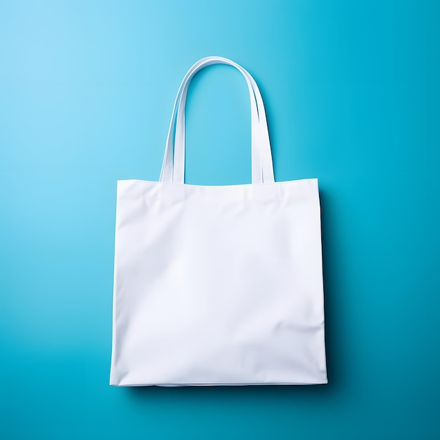 White Tote Bag Without Words Isolated On Blue Background Mock Up