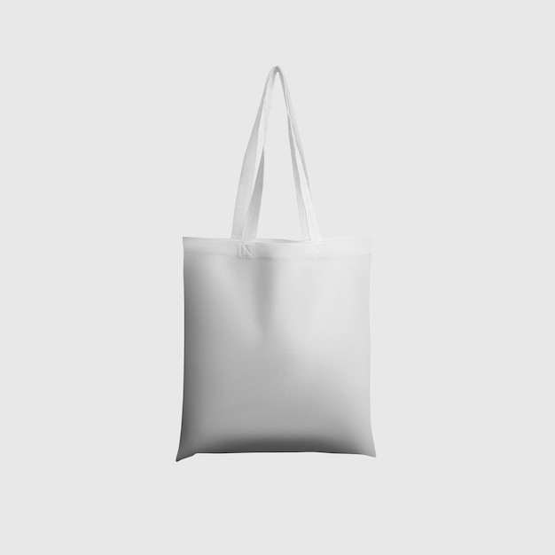 White totebag 3d rendering reusable ecobag with handle for shopping isolated on background