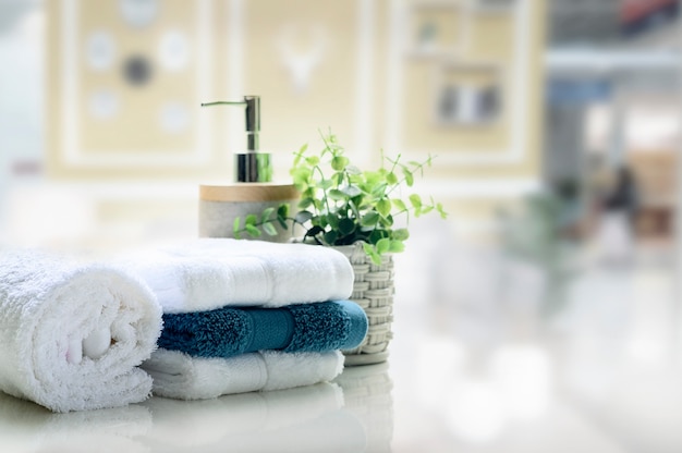 Clean towels and houseplants on a white table 1309886 Stock Photo at  Vecteezy