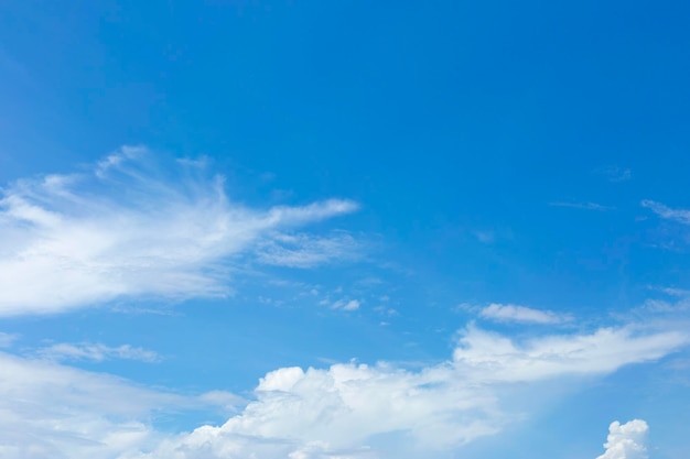 White transparent clouds on blue sky background