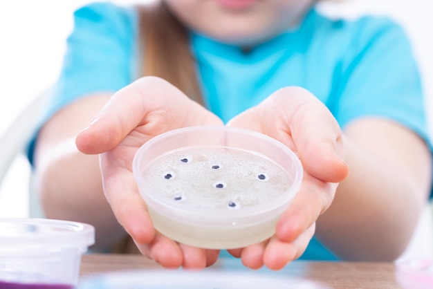 White transparent mucus on the hands of the child