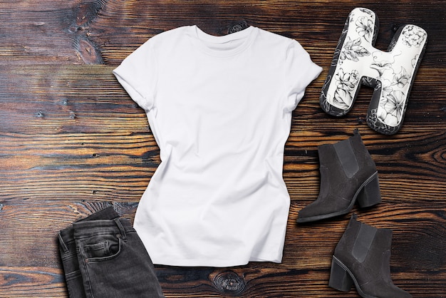 White Tshirt Flat Lay ,  clothes and shoes on wooden background