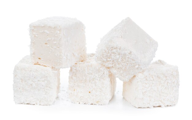 White Turkish delight with coconut shavings isolated on white