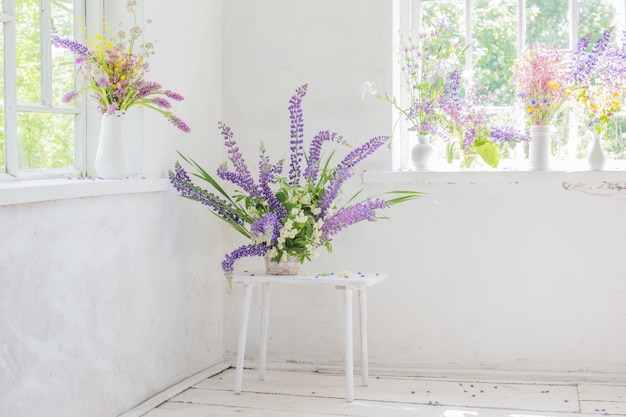 White vintage interior with flowers