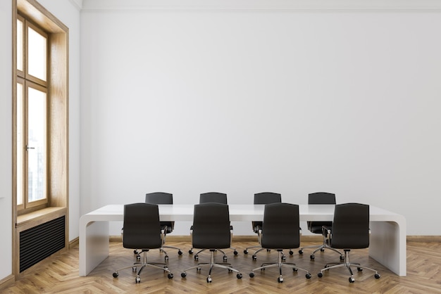 White wall conference room interior with a wooden floor, a long white table with black chairs standing around it and large windows. 3d rendering mock up