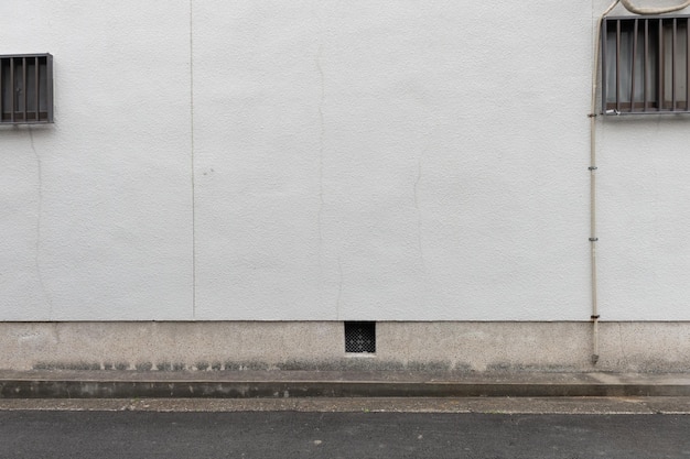 Photo white wall with building in background