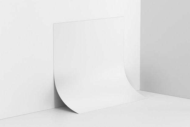 A white wall with a curved white banner on it.