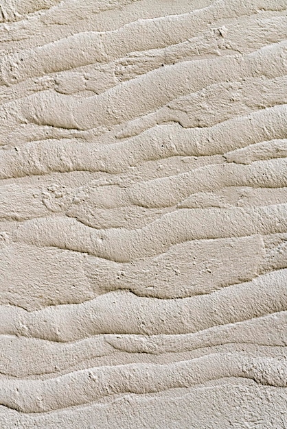 White wall with texture waves