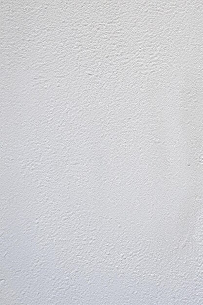 a white wall with a white textured background that has a pattern of the word quot h quot on it