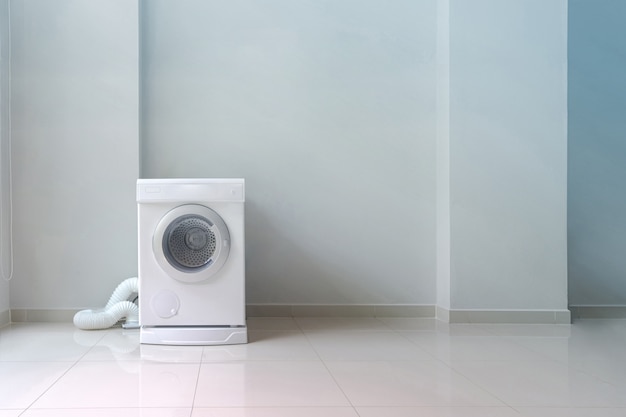 White washing machine in laundry room