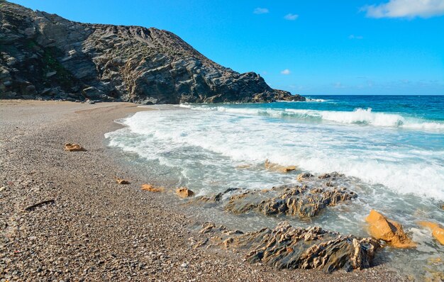 White water in Argentiera sandy shore Sardinia