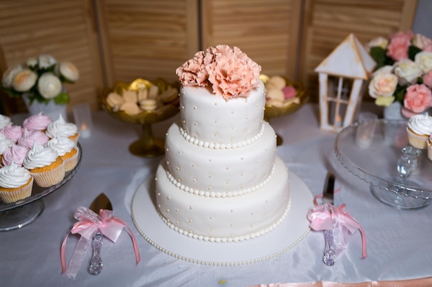 White wedding cake with flowers Wedding decoration