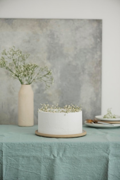 White wedding cake with flowers