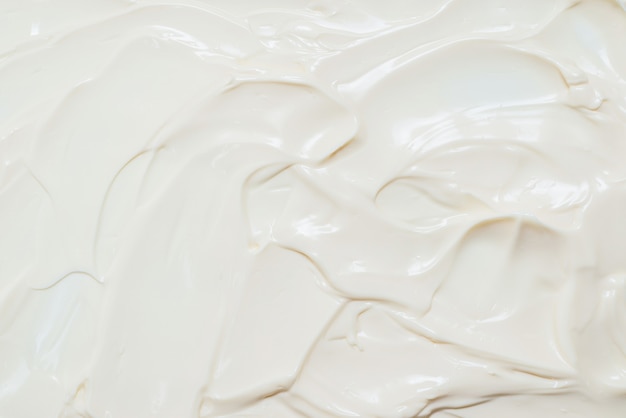 White whipped cream texture. Top view.