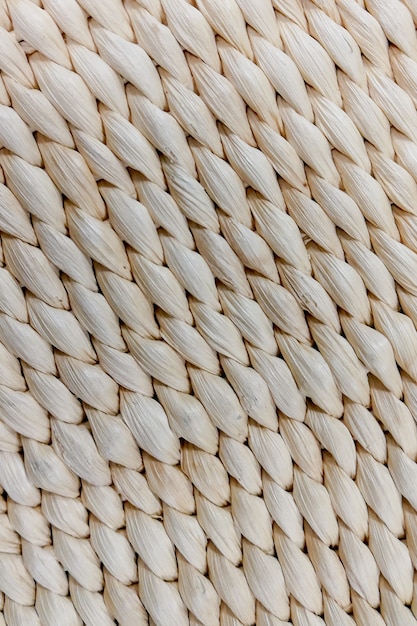 Поверхность белой плетеной мебели. можно использовать как текстуру.