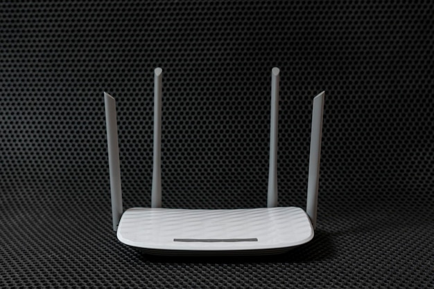 A white wifi router isolated internet communication\
equipment