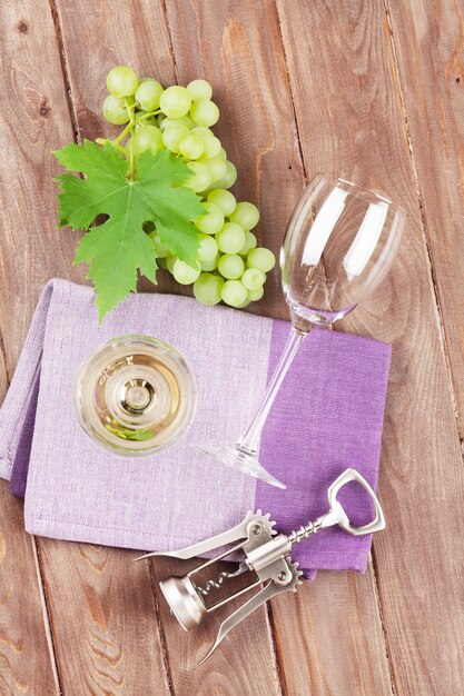 White wine glass and grapes