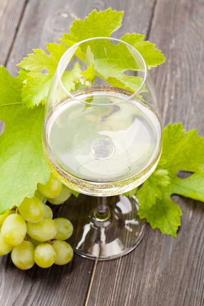 White wine glass and white grape