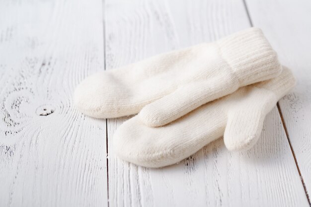 White women's knitted mittens