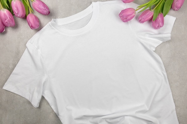 White womens cotton tshirt mockup with pink tulips, design t-shirt template