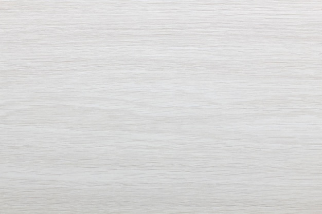 A white wood background with a rough texture