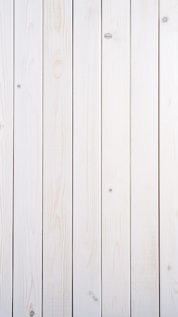 a white wood wall with a few holes in it