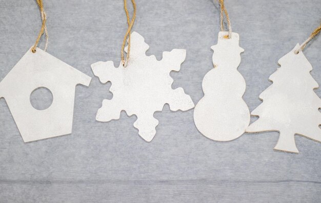 white wooden eco toys painted manually placed on grey background for toys handmade christmas