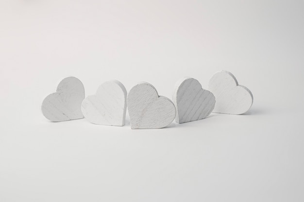 White wooden heart isolated on white