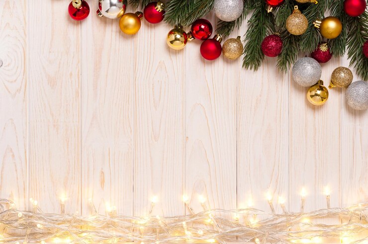 Photo white wooden plank with fir tree and decorations christmas and new year concept