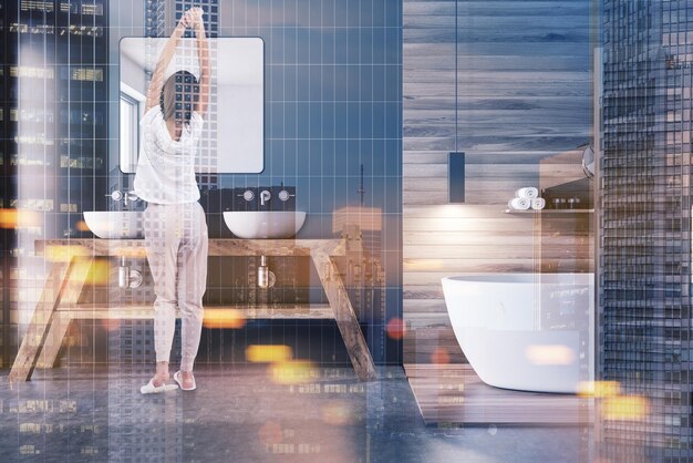 Photo white and wooden wall bathroom with a tub and a make up shelf. a double sink near a gray wall. a woman concept of a modern house design. 3d rendering toned image double exposure