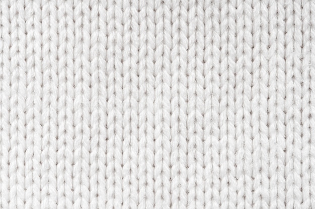 Белый шерстяной свитер текстура фон