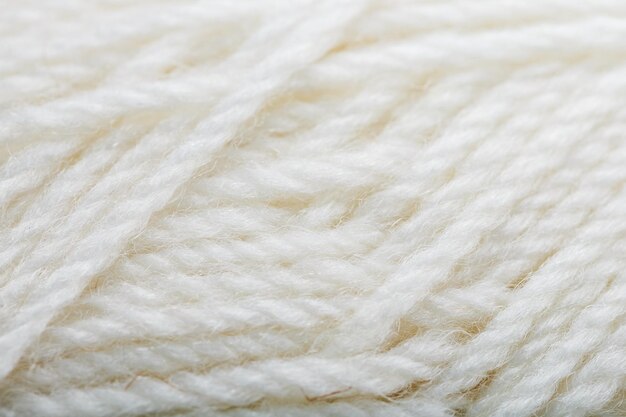 White wool yarn close-up in full screen