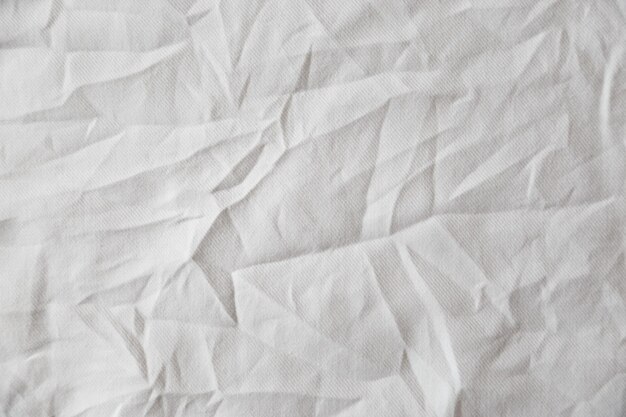 White wrinkled canvas cloth texture background