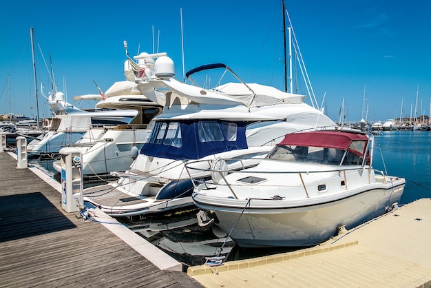 White yachts in the port are waiting Rimini Italy