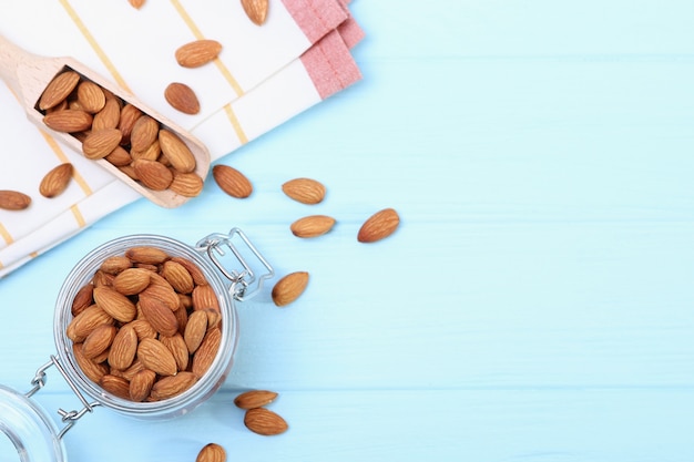 Whole almonds on the table on a light background closeup