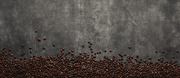 Whole bean coffee isolated on grey banner concrete background