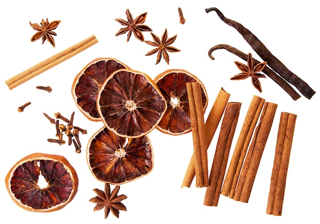 Whole cinnamon isolated Whole cinnamon sticks orange circle dry cloves vanilla pods