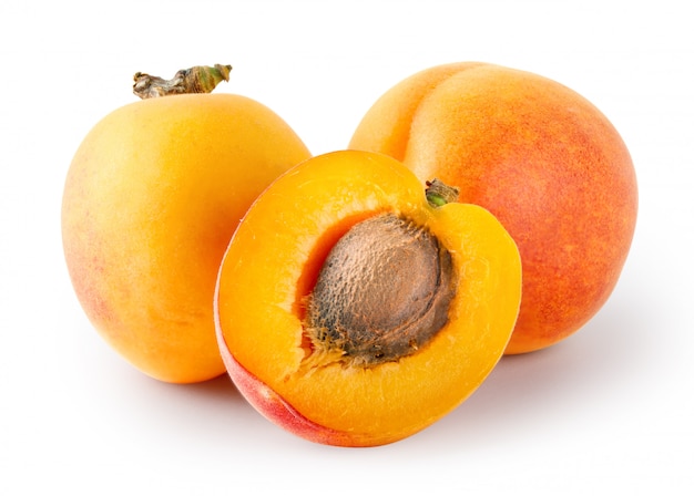 Whole and cut apricots with stones