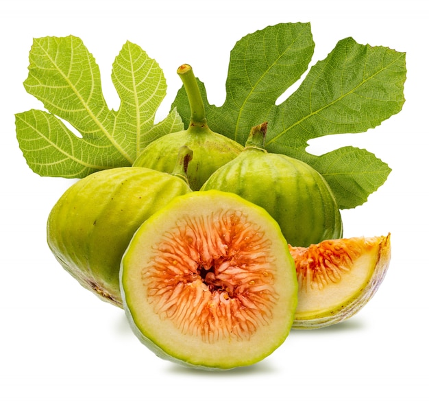 Whole and cut green figs, with fig leaves. Isolated.