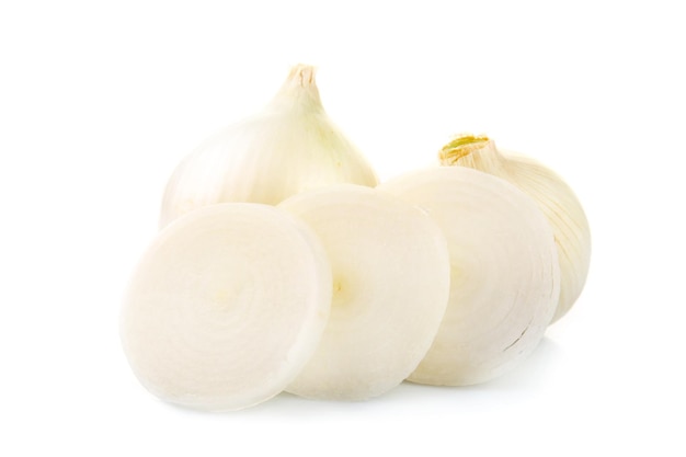 Whole and cut onions isolated on white