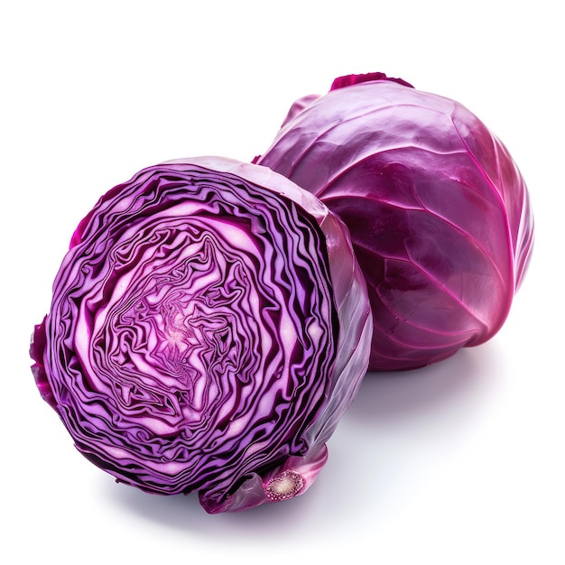 Whole and cut red cabbages on white background