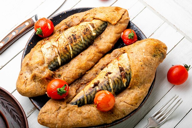 Whole fish baked in dough fish pie