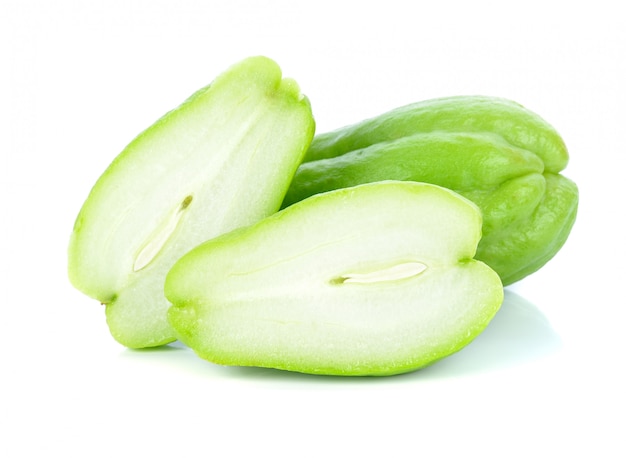 Whole fresh chayote on white background