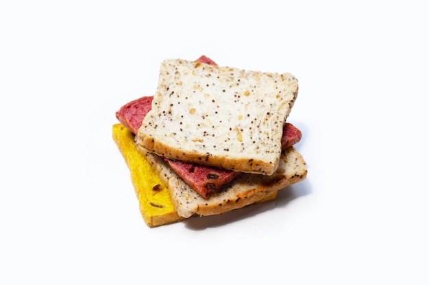 Whole grain bread slices on white background