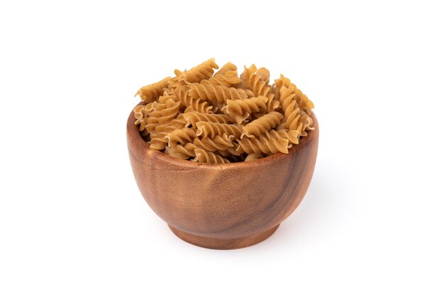 Whole grain pasta isolated on a white background