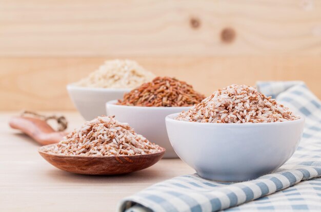 Whole grain Traditional Thai rice best rice for healthy and clean food in coconut wooden bowl