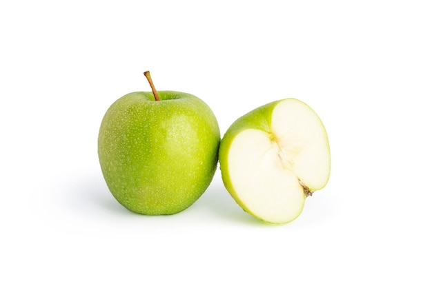 Whole green apple and a half isolated on white background with waterdrops