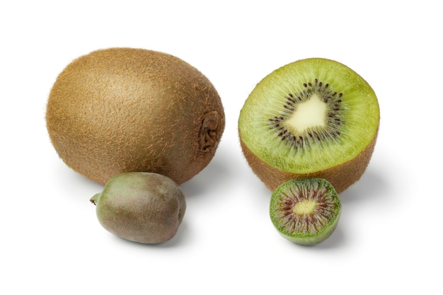 Whole and half kiwi fruit and kiwi berry