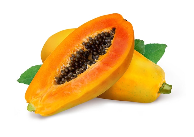 Whole and half of ripe papaya fruit with seeds isolated on white background