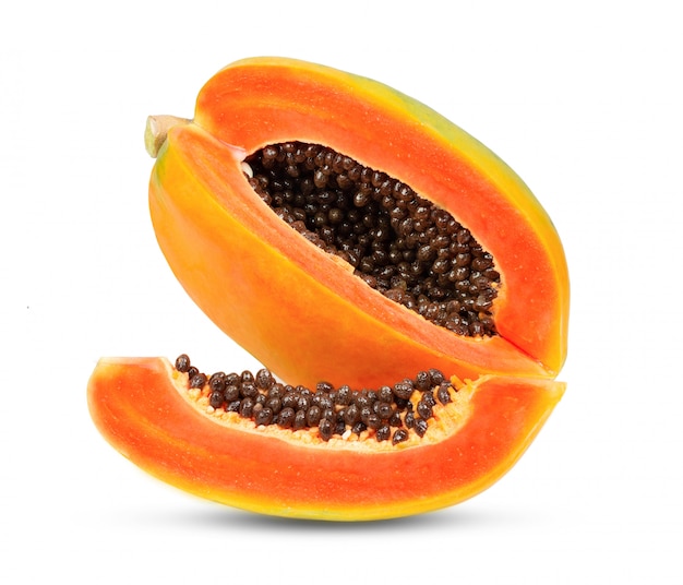 Whole and half ripe papaya isolated on white background. full depth of field